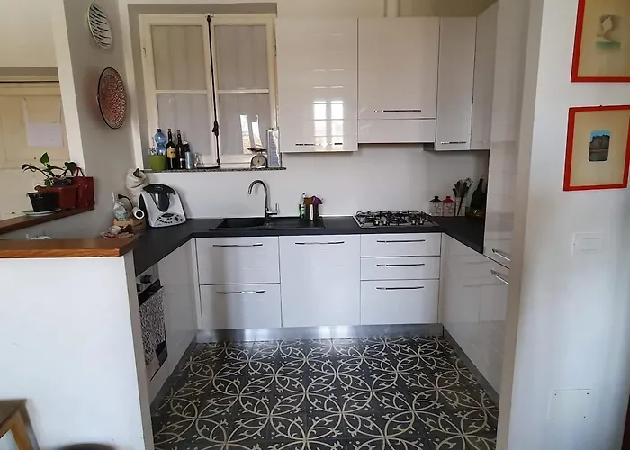 Luminoso Attico Con Terrazza Апартаменты